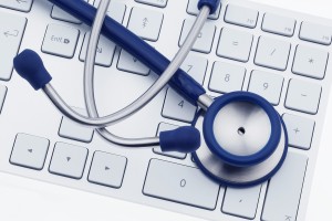 Stethoscope on computer keyboard